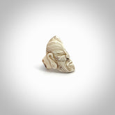 Hand carved Moko man face ring. Made from Red Deer antler in New Zealand. Unique Moko Man ring hand made from deer antler by master bone carver Fumio Noguchi. Spectacular collectable work of art, made to wear. One only ring, delivered to you at no extra cost with express courier.